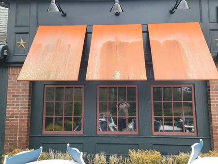 How to remove algae and salt stains from your home exterior in massachusetts